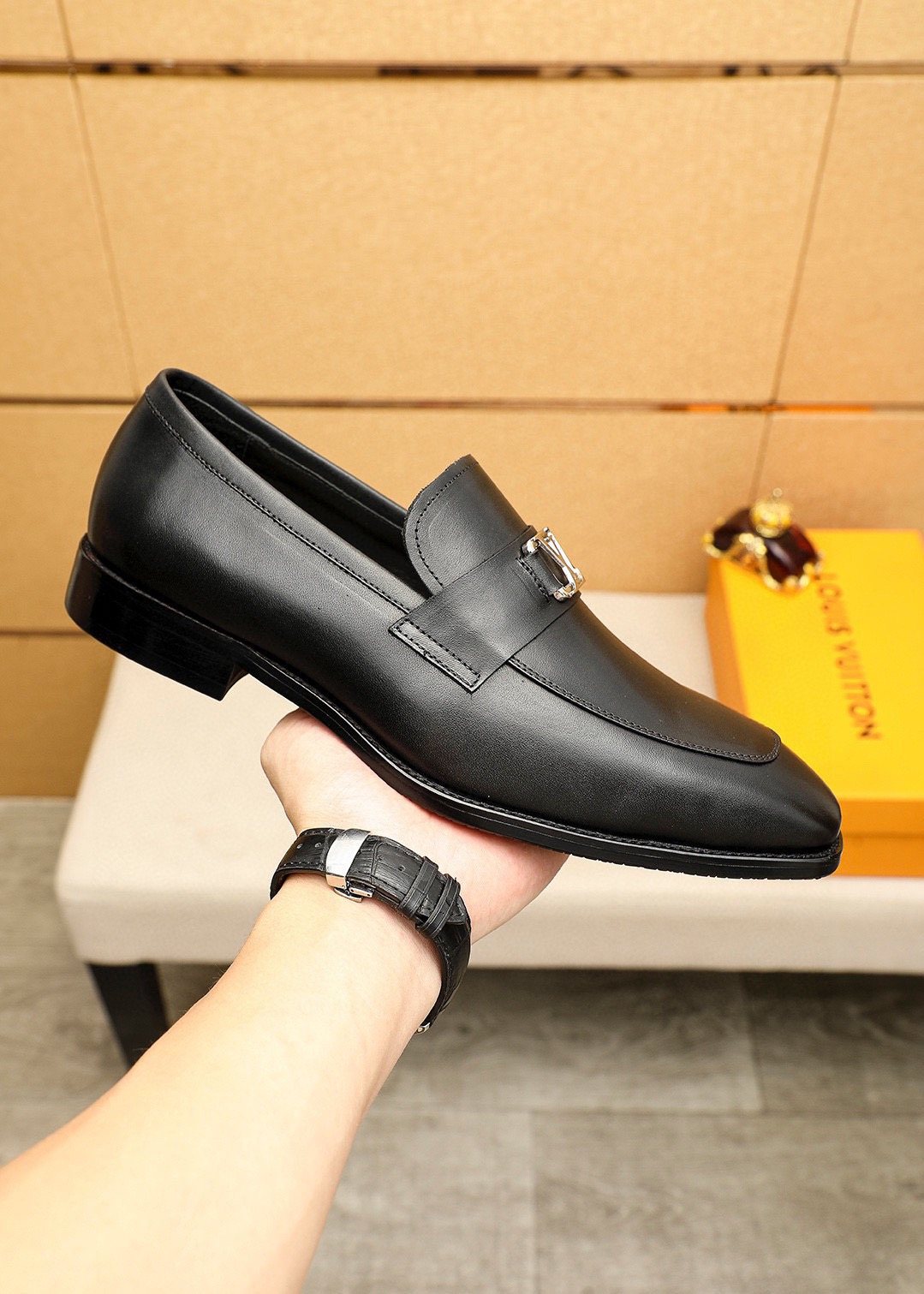 Louis Vuitton Black Metal-Accent Loafers — model