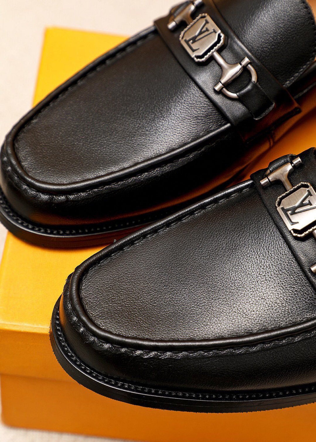 Louis Vuitton Black Metal-Accent Loafers — detail