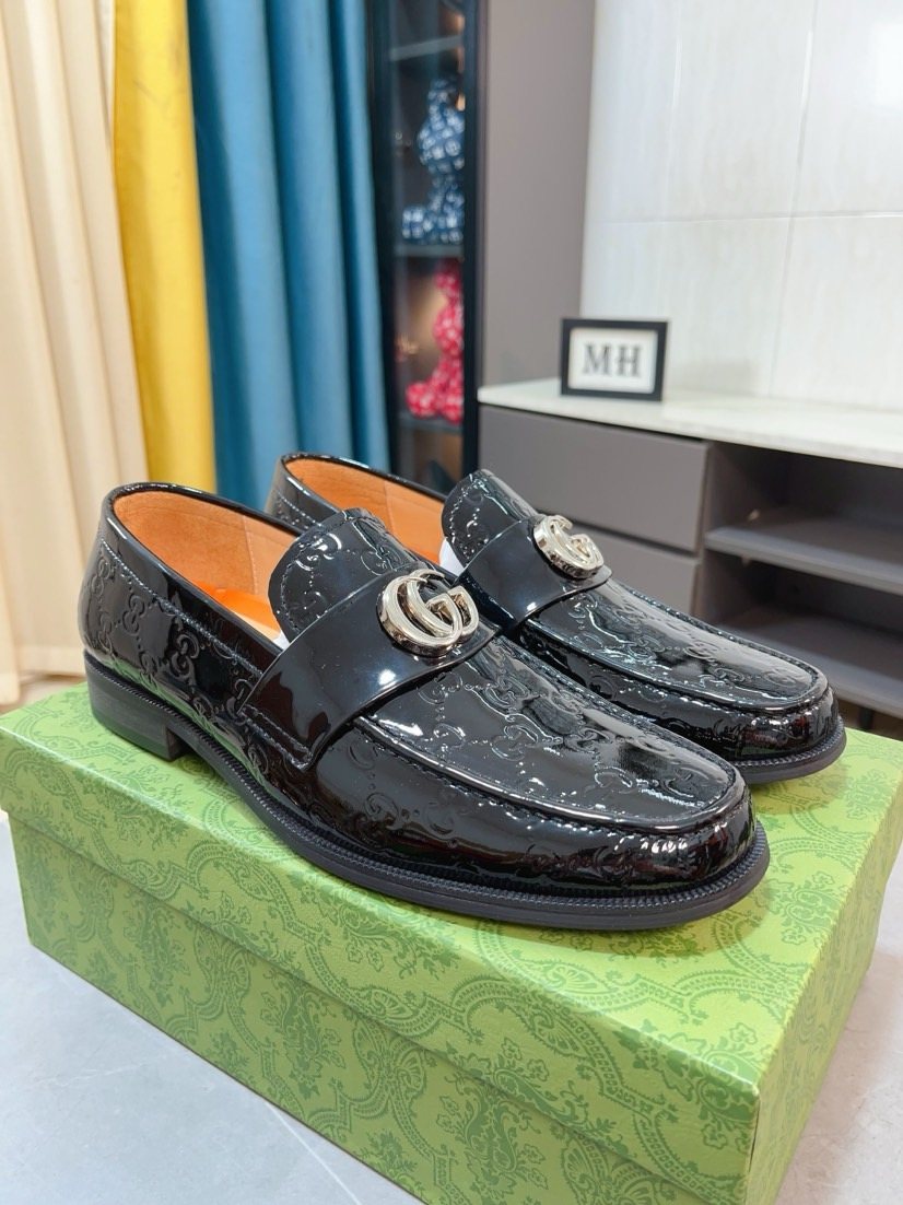 Gucci Embossed Metal-Hardware Loafers — front